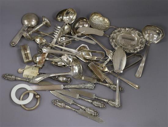 A quantity of mainly sterling silver items including flatware, napkin rings etc, weighable silver 27 oz.